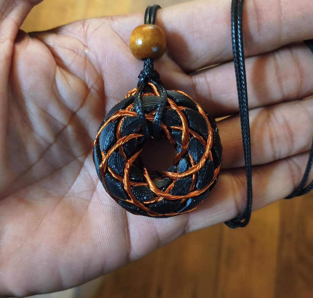 Flower of Life Torus Rodin coil pendant, Genuine Shungite.